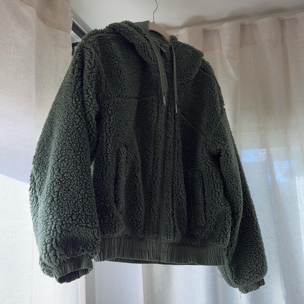 Reversible fleece green jacket. Lululemon size 8. Excellent condition.